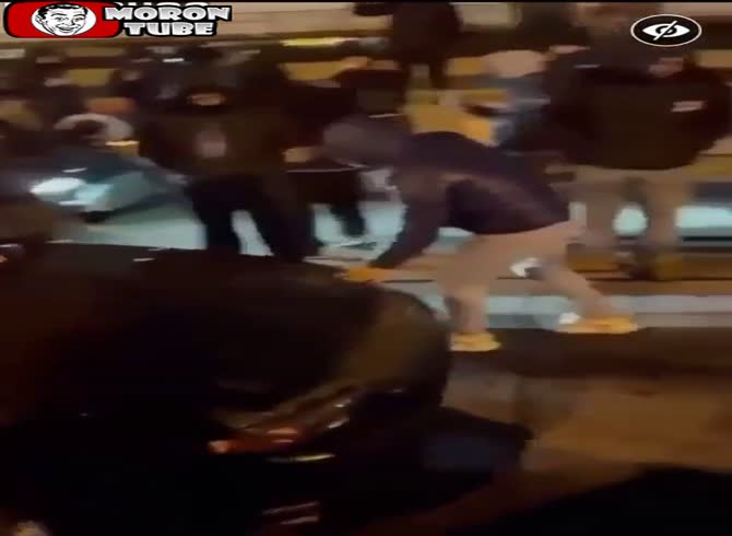 Video :At an unauthorized rally, a car races through the crowd (Warning - frightening)